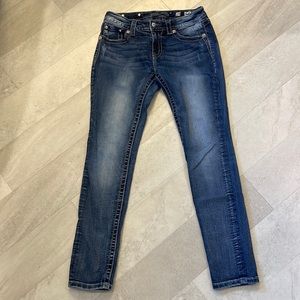 Miss Me Jeans.  Mid-rise / skinny.